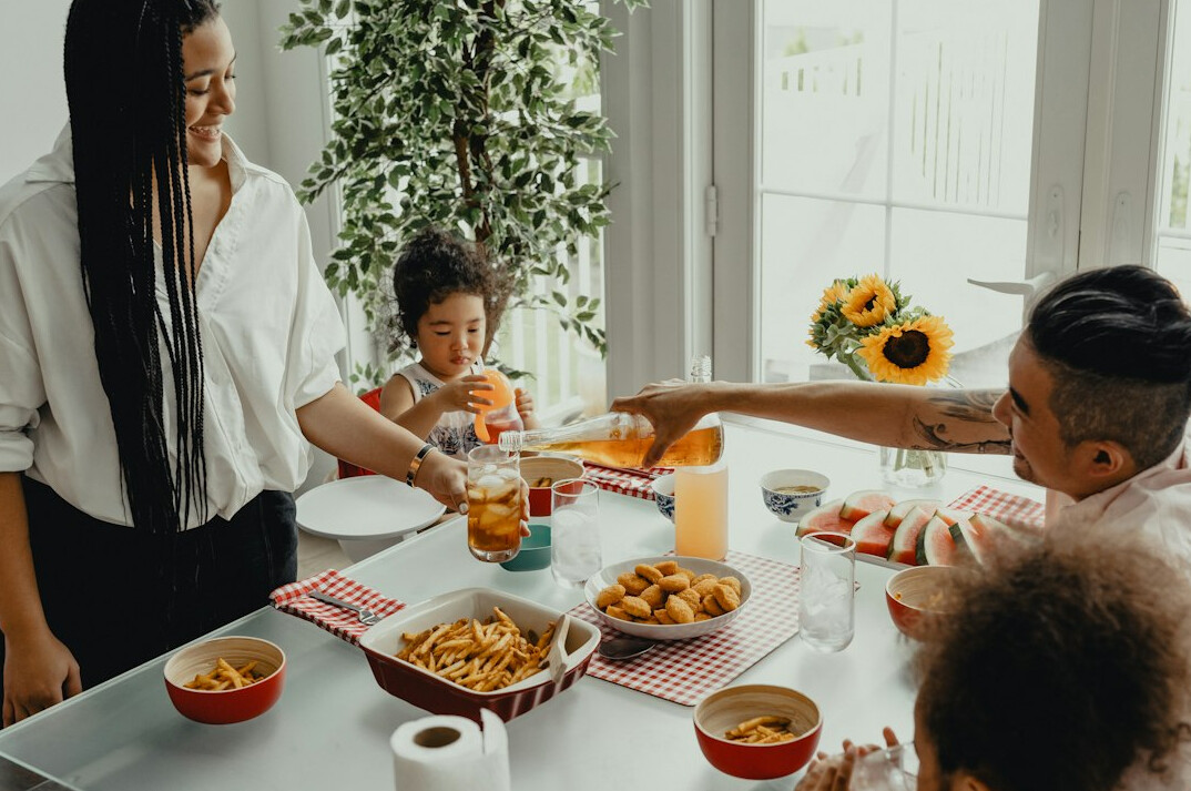 family budgeting at kitchen table