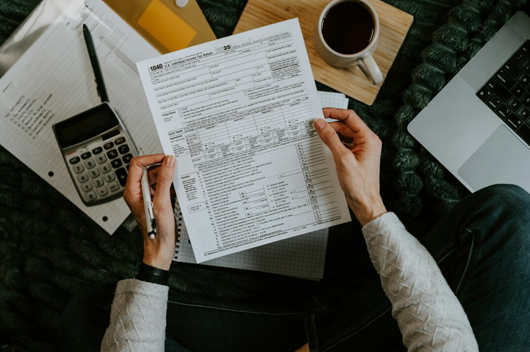 person reviewing loan documents
